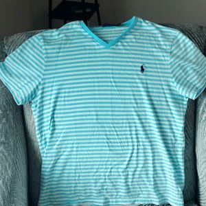 LG Polo T-shirt. Stripped blue and white